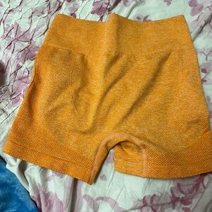 Orange workout shorts Size M